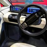 eva electric car on road price